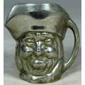 SMALL METAL JUG WITH FACE -BID NOW
