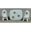 MINIATURE-MINIATURE PORCELAIN TABLE AND 2 CHAIRS BID NOW!!