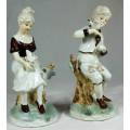 STUNNING FIGURINES OF A COUPLE HOLDING DOVES-BID NOW!!