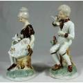 STUNNING FIGURINES OF A COUPLE HOLDING DOVES-BID NOW!!