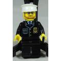 LEGO MINI FIGURINE-POLICEMAN WITH A BEARD AND A WHITE HAT BID NOW