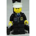 LEGO MINI FIGURINE-POLICEMAN WITH A SMIRK AND A WHITE HAT BID NOW
