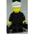 LEGO MINI FIGURINE-POLICEMAN WITH A SMIRK AND A WHITE HAT BID NOW