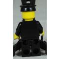 LEGO MINI FIGURINE-POLICEMAN WITH A BLACK HAT BID NOW