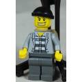 LEGO MINI FIGURINE-JAIL PRISONER WITH GOLD TOOTH AND BACK PACK(CTY0201) BID NOW!!