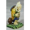 MUD MAN SEATED FISHERMAN (EXTRA ORDINARY CRAFTSMANSHIP AND A MUST HAVE)-BID NOW!!