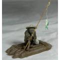 STUNNING COLLECTABLE MUD MEN-MAN ON A RAFT WITH A FISH-BID NOW!!!