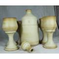 STONEWARE DECANTER AND SIX GLASSES(LOVELY) BID NOW!
