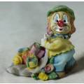 MINIATURE CLOWN-WITH PRESENTS ON A LARGE LEAF(LOVELY) BID NOW!!!