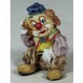 MINIATURE CLOWN SEATED SCRATCHING HIS HEAD (LOVELY) BID NOW!!!