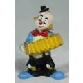 MINIATURE CLOWN PLAYING A YELLOW CONCERTINA(LOVELY) BID NOW!!!
