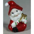 MINIATURE  BABY IN A CHRISTMAS SUIT (LOVELY) BID NOW!!!