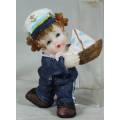 KID SAILOR IN BLUE HOLDING A SAIL BOAT-LOVELY-BID NOW!!