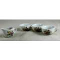 THREE SMALL PORCELAIN CUPS WITH A MILK JUG-(LOVELY)BID NOW!!