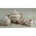 PINK KIDS TEA SET WITH A BABY FACE IMPRINT(LOVELY)BID NOW!!