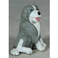 MEG PLASTIC SEATED DOG-BID NOW!!