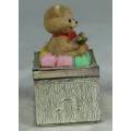 BEAR CUB SITTING ON A METAL PILL BOX (VELVET LINER)-BID NOW!!