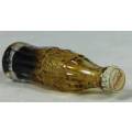 Miniature Coke Bottle - Act fast and bid now!