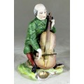 Musician Playing Cello Figurine - Low Price!! Bid Now!!