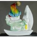 Clown Figurine - On A Sailboat - BID NOW