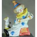 Clown Figurine -  With Puppy Playing a Concertina - BID NOW