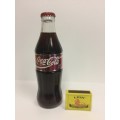 VINTAGE and RARE SEALD Commemorative Coca Cola bottle with foil label "thanking the seller"