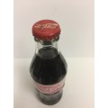 VINTAGE and RARE SEALD Commemorative Coca Cola bottle with foil label "thanking the seller"