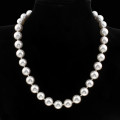 White Genuine Cultured Pearl Necklace, 15inch length and pearls are 9mm.