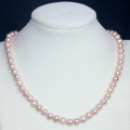 Pink Grade A Genuine Cultured Pearl Necklace, 15inch and pearls are 8mm.
