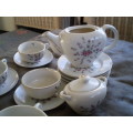 Vintage set of 5 floral miniature cups and saucers, plates one teapot and sugar pot