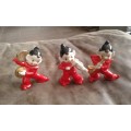 Three Porcelain Figurines Of Little Musicians