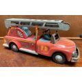 Wind Up Fire Department Truck with moveable ladder tin