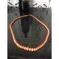 Genuine Natural Antique Salmon Coral Beaded Necklace with gold clip in clasp.