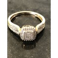 9ct YELLOW GOLD ENGAGEMENT RING WITH ABOUT 90 SMALL ROUND BRILLIANT CUT DIAMONDS TOTALLING +/-0,25ct