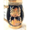 Set of 2 Graduating German Pottery Beer Steins Complete with pewter Lids.