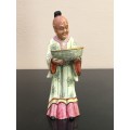 Antique Chinese Shiwan male figurine hand sculpted and decorated.