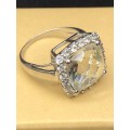 WOW !!! STUNNING STERLING SILVER DRESS RING WITH A WHOPPING 6.9 CARAT CZ SURROUNDED BY SMALLER CZ`s