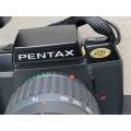 PENTAX SF7 35mm SLR FILM CAMERA WITH EXTRA LENS MANUALS AND AN AF 240FT FLASH IN CARRY BAG