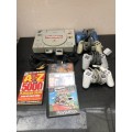 ORIGINAL PLAYSTATION CONSOLE WITH REMOTES , MEMORY CARDS AND 4 ORIGINAL GAMES - WORKING