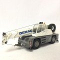 Conrad #2089 Demag AC25 city class die-cast mobile crane model - scale 1/50 - some small damage