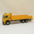 Die-cast and plastic construction truck model