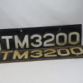 Pair of vintage plastic and metal numberplates - TM 3200 - One without metal backing