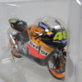 Maisto 2003 Honda RCV 211 Repsol MotoGP die-cast motorcycle - #46 Valentino Rossi - Scale 1/18