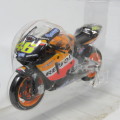 Maisto 2003 Honda RCV 211 Repsol MotoGP die-cast motorcycle - #46 Valentino Rossi - Scale 1/18