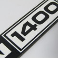 Nissan 1400 bakkie plastic car badge