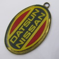 Vintage Datsun Nissan keyring holder - some damage