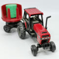 ERTL Case International 2594 tractor with case 8610 bale processor trailer