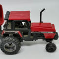 ERTL Case International 2594 tractor with case 8610 bale processor trailer