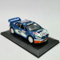 Bburago 2006 OMV Peugeot Norway World Rally team die-cast model car - scale 1/32