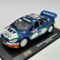 Bburago 2006 OMV Peugeot Norway World Rally team die-cast model car - scale 1/32